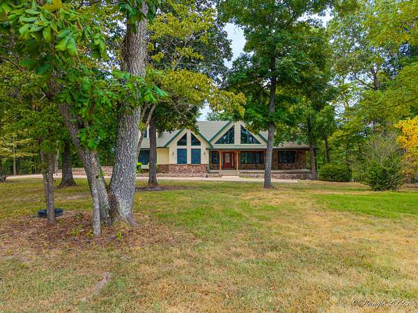 65 Acres of Land with Home for Sale in West Plains, Missouri