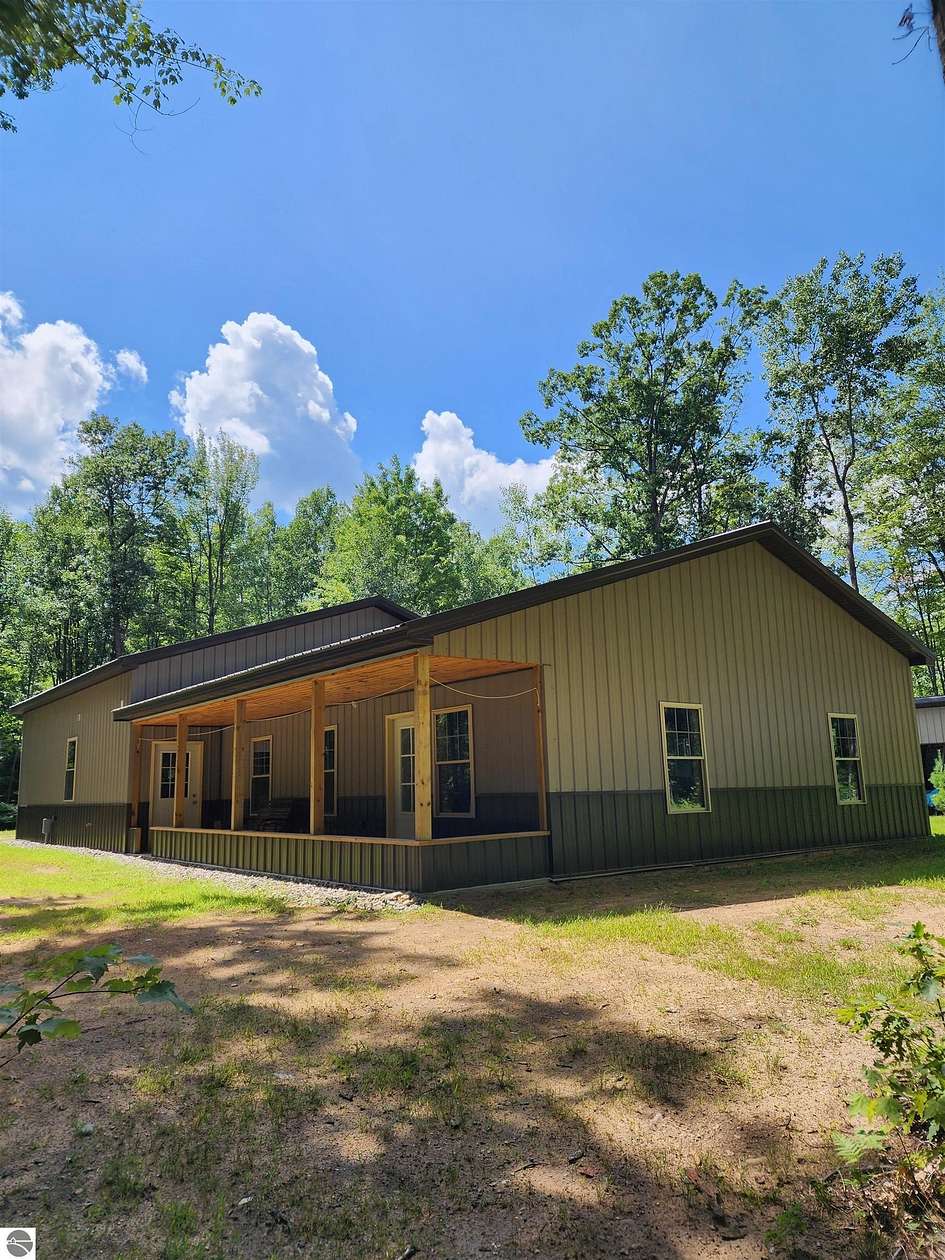 10 Acres of Recreational Land with Home for Sale in Houghton Lake, Michigan