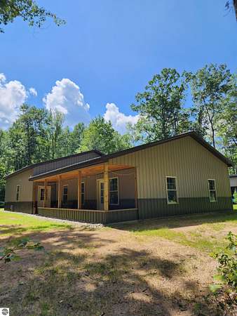 10 Acres of Recreational Land with Home for Sale in Houghton Lake, Michigan