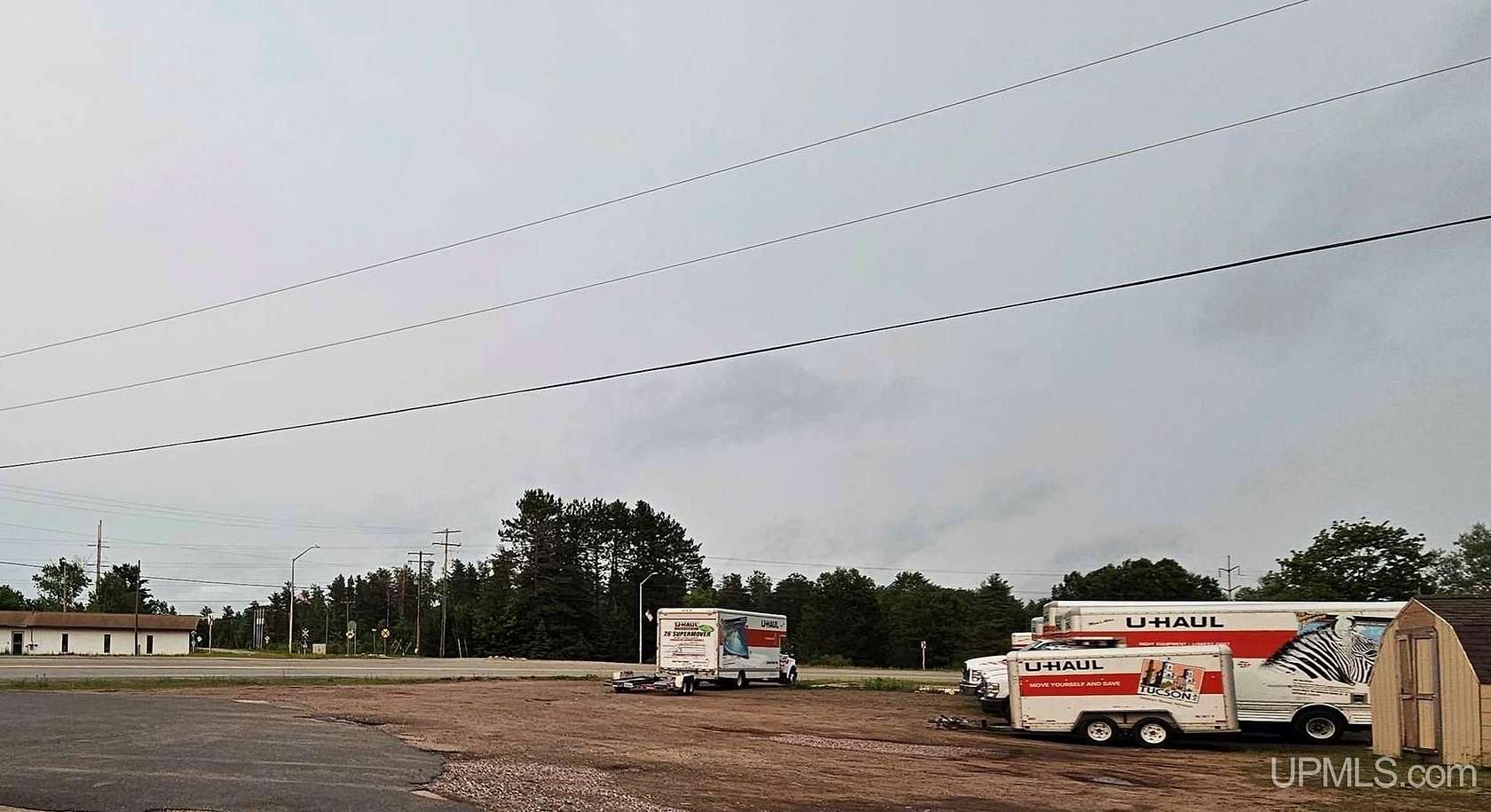 0.77 Acres of Commercial Land for Sale in Little Lake, Michigan