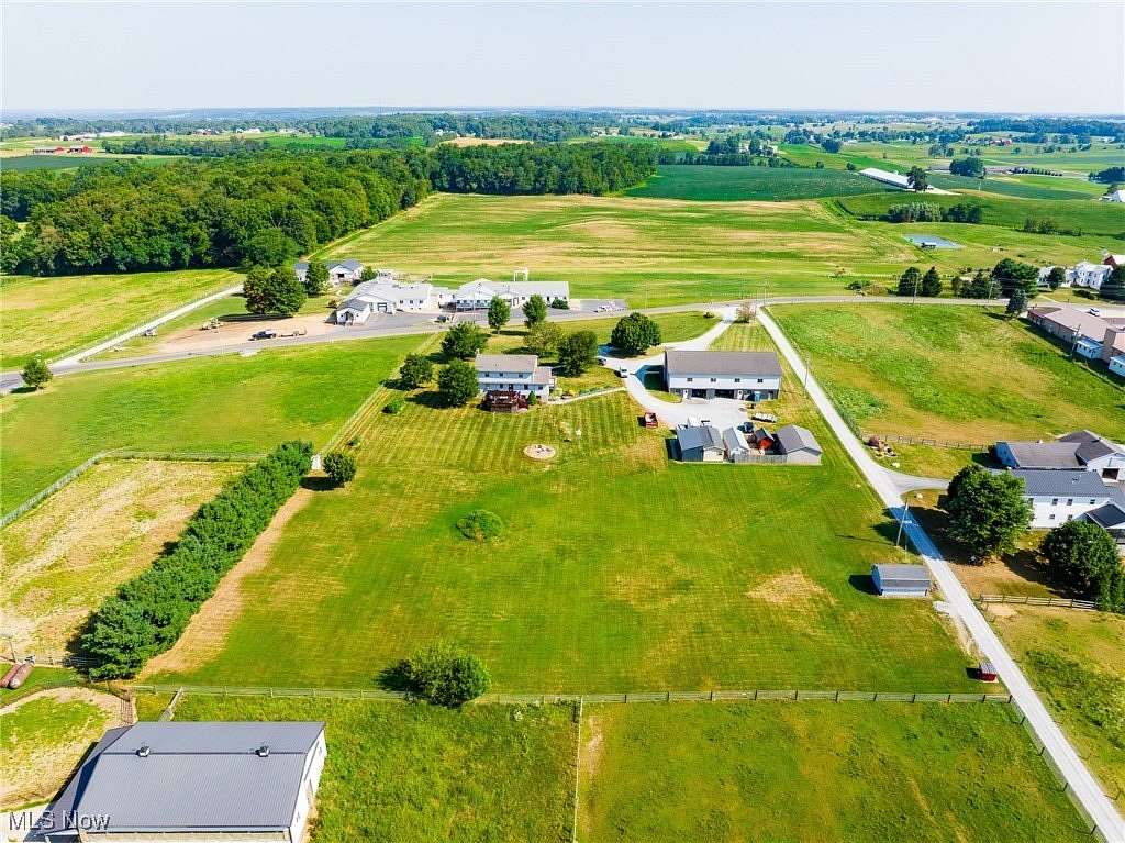 3.68 Acres of Residential Land with Home for Auction in Apple Creek, Ohio