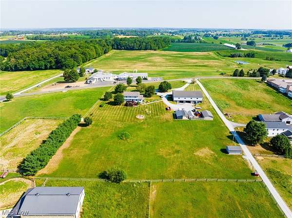 3.68 Acres of Residential Land with Home for Auction in Apple Creek, Ohio