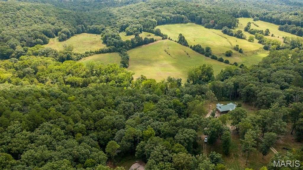 51.3 Acres of Land with Home for Sale in Licking, Missouri