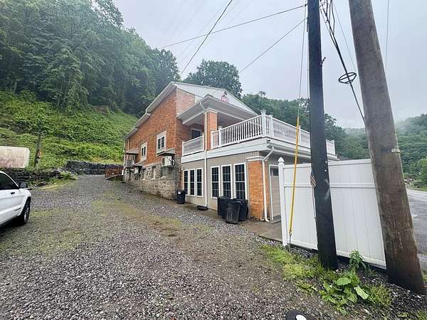 7.4 Acres of Residential Land with Home for Sale in Northfork, West Virginia