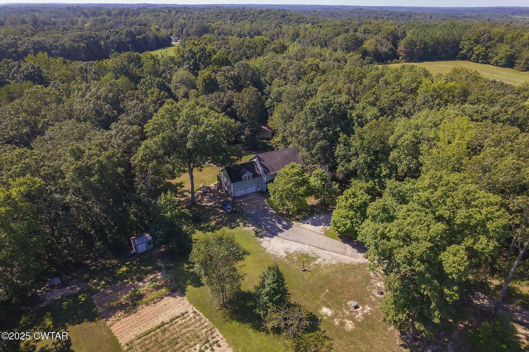 5 Acres of Residential Land with Home for Sale in Henderson, Tennessee