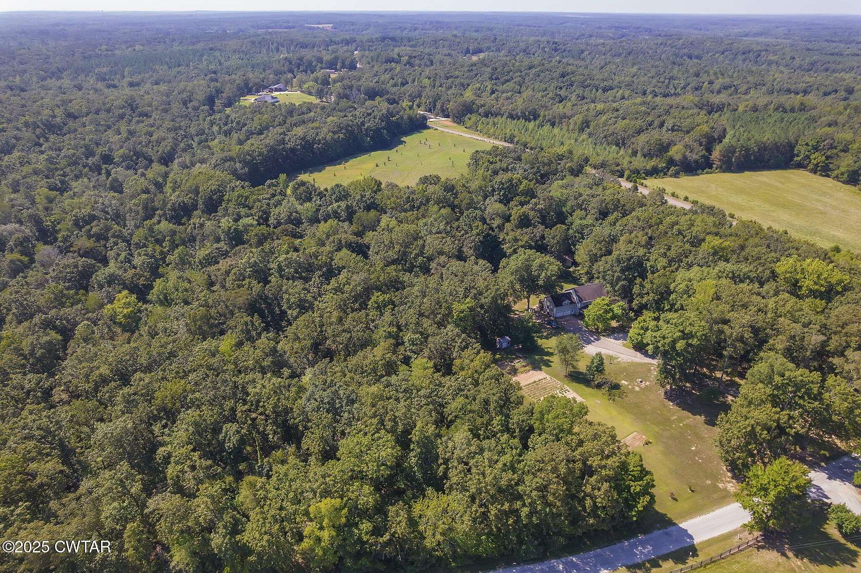 5 Acres of Land with Home for Sale in Henderson, Tennessee