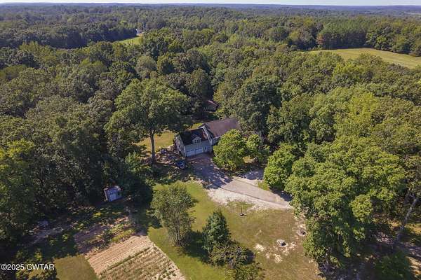 5 Acres of Residential Land with Home for Sale in Henderson, Tennessee