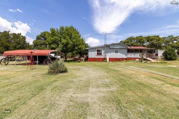 10 Acres of Residential Land with Home for Sale in Iowa Park, Texas