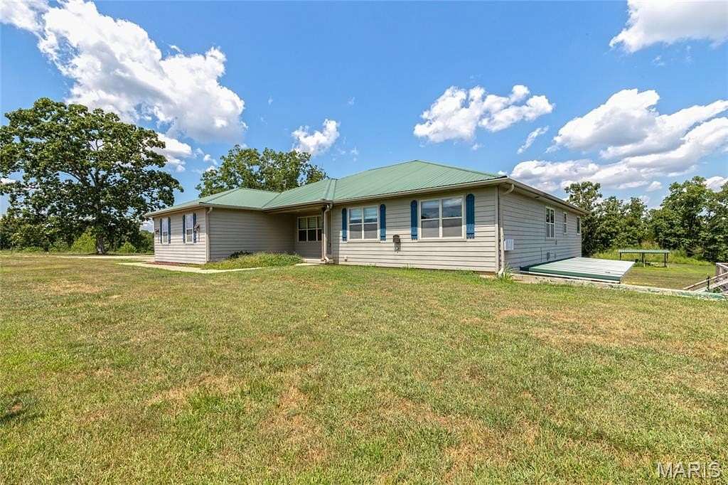250 Acres of Agricultural Land with Home for Sale in Waynesville, Missouri