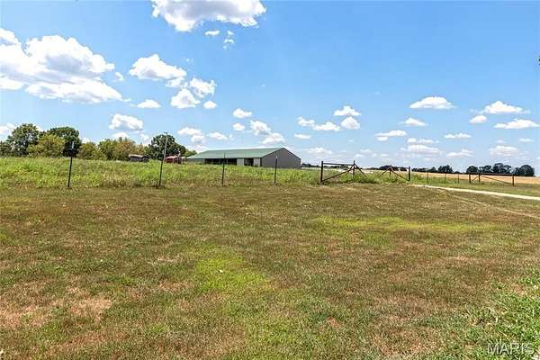 250 Acres of Agricultural Land with Home for Sale in Waynesville, Missouri