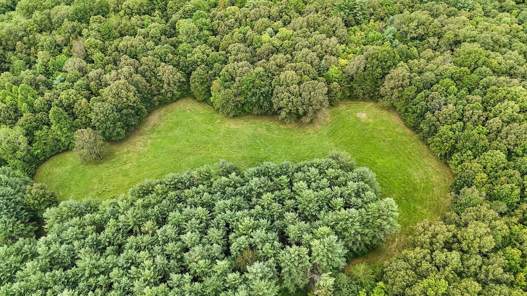 19.6 Acres of Land with Home for Sale in Lancing, Tennessee