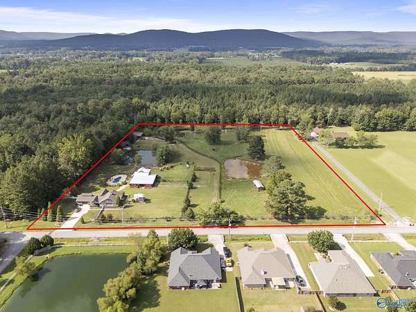 8.4 Acres of Land with Home for Sale in Owens Cross Roads, Alabama