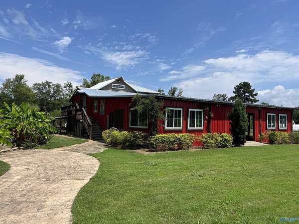 8.4 Acres of Land with Home for Sale in Owens Cross Roads, Alabama