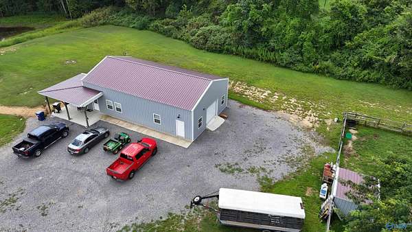 13.8 Acres of Land with Home for Sale in Arab, Alabama