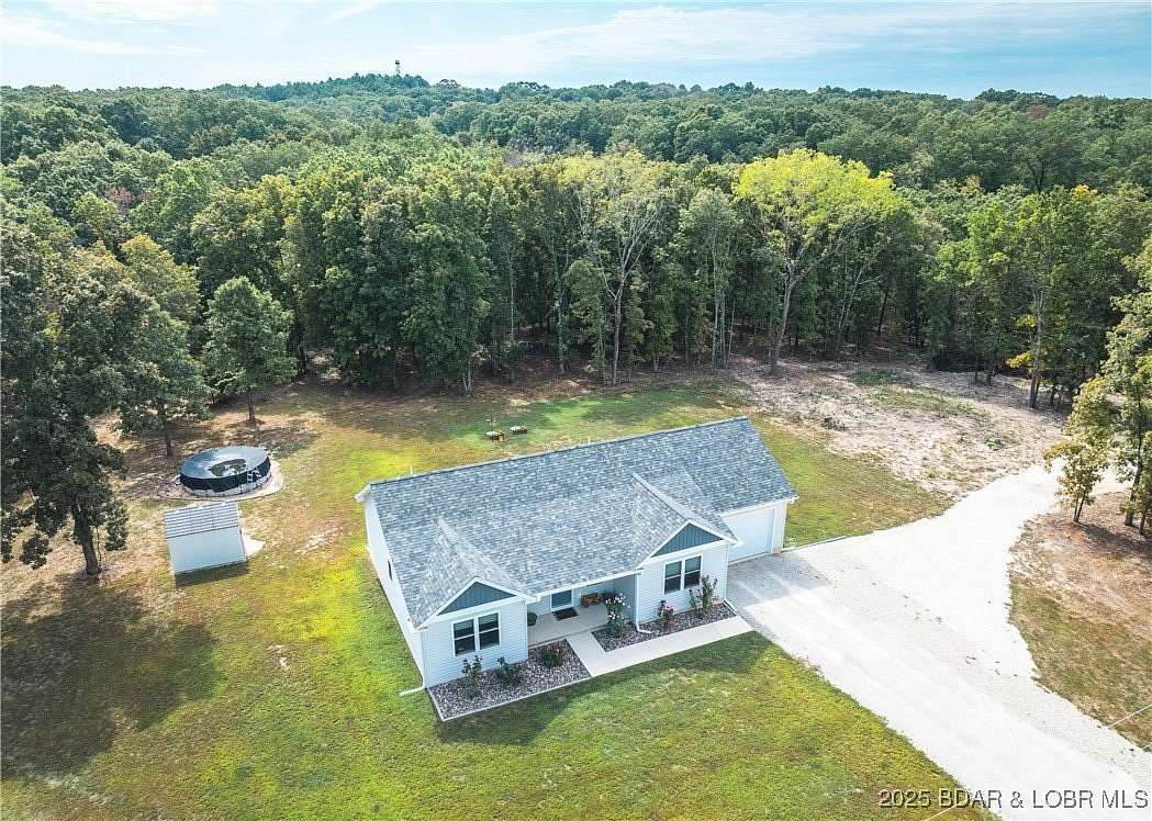 5.22 Acres of Residential Land with Home for Sale in Climax Springs, Missouri