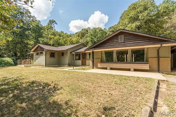 4.83 Acres of Residential Land with Home for Sale in Dexter, Missouri