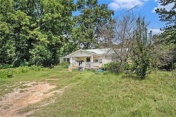 3 Acres of Residential Land with Home for Sale in Jackson, Georgia