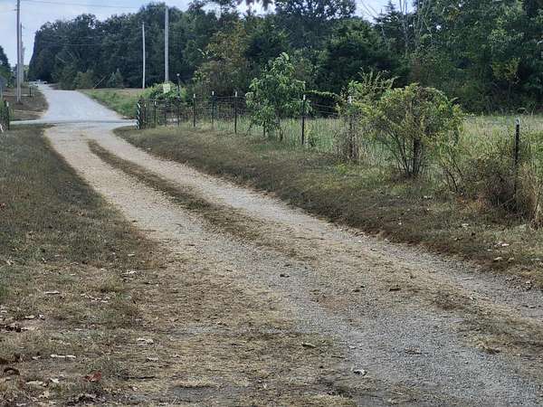 9.73 Acres of Residential Land with Home for Sale in Plato, Missouri