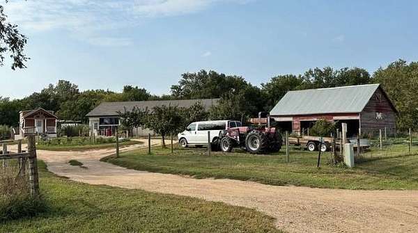 27 Acres of Land with Home for Auction in Viborg, South Dakota