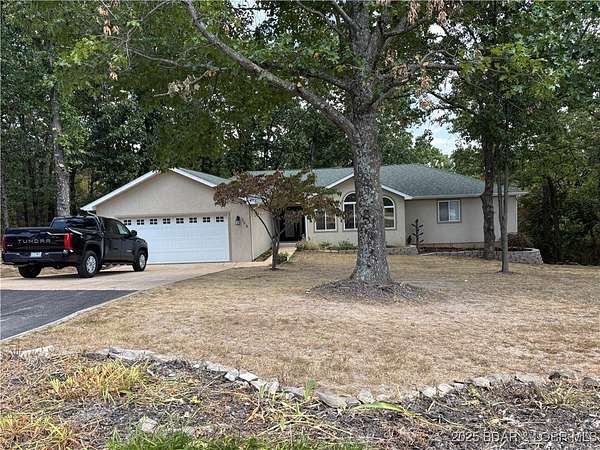 3.4 Acres of Residential Land with Home for Sale in Camdenton, Missouri