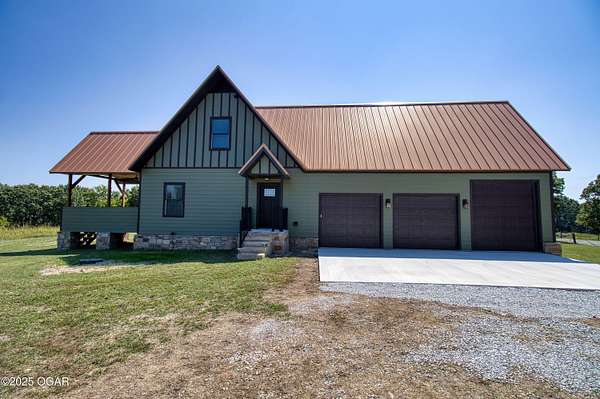 38 Acres of Land with Home for Sale in Goodman, Missouri