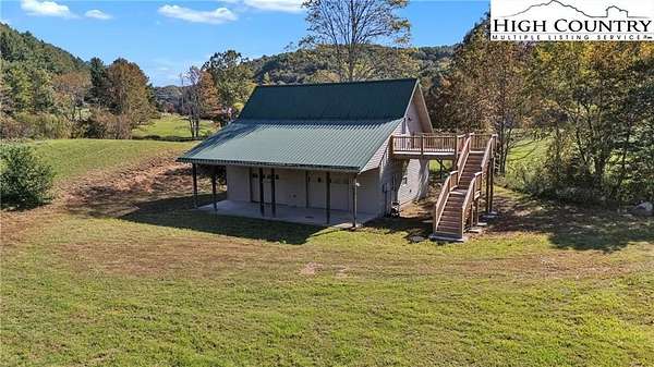 10.3 Acres of Land with Home for Sale in Creston, North Carolina