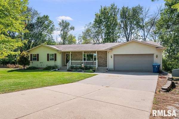1.56 Acres of Residential Land with Home for Sale in Blue Grass, Iowa