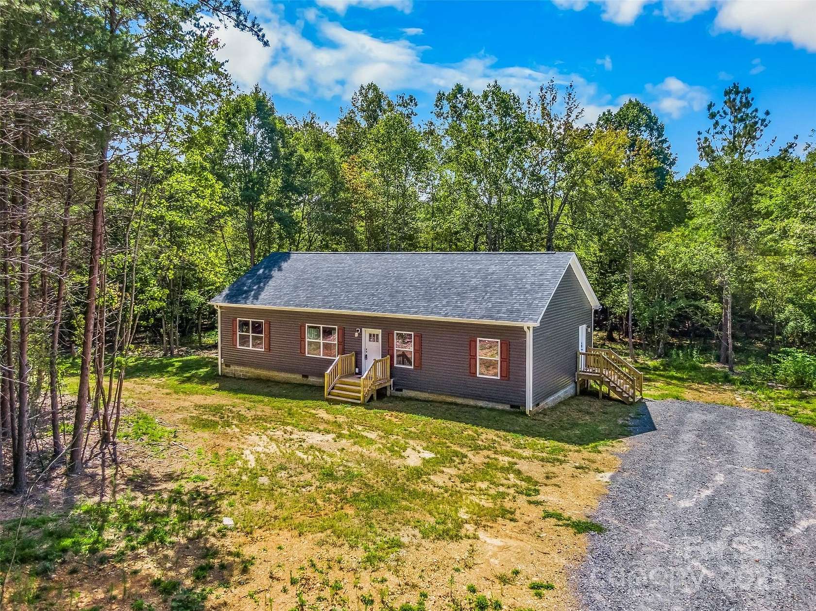 11.4 Acres of Land with Home for Sale in New London, North Carolina