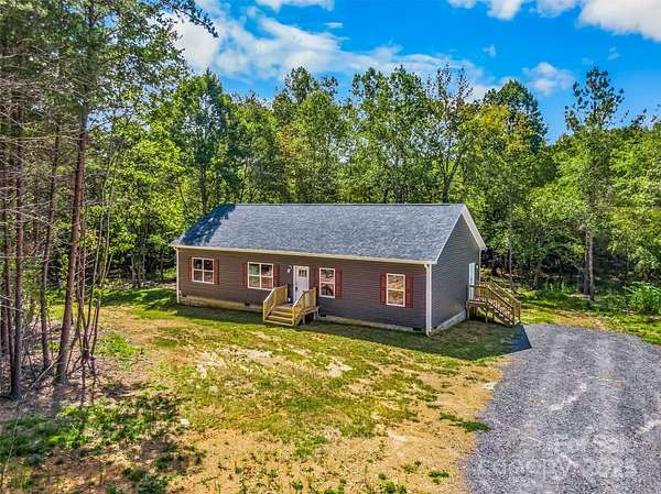 11.4 Acres of Land with Home for Sale in New London, North Carolina