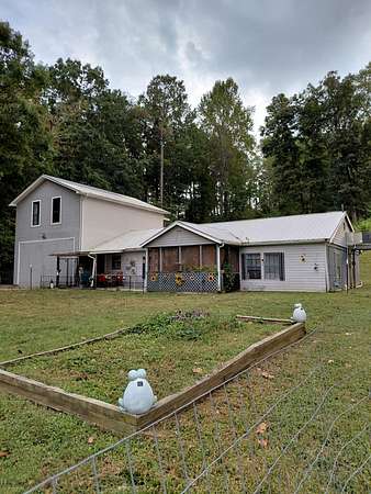 7.32 Acres of Residential Land with Home for Sale in Dayton, Tennessee