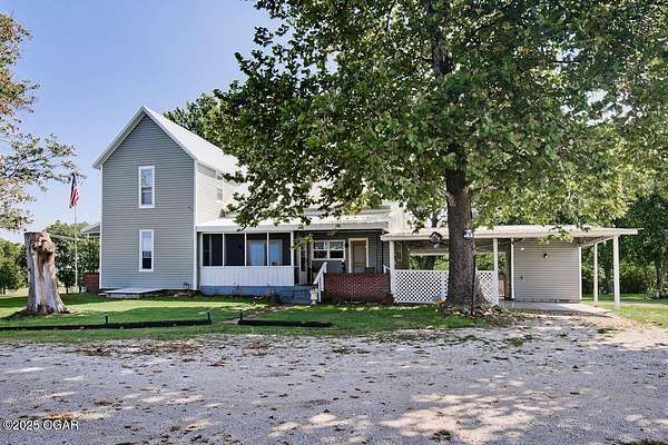 9 Acres of Residential Land with Home for Sale in Carthage, Missouri