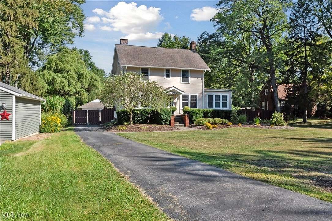 1.5 Acres of Residential Land with Home for Sale in North Olmsted, Ohio