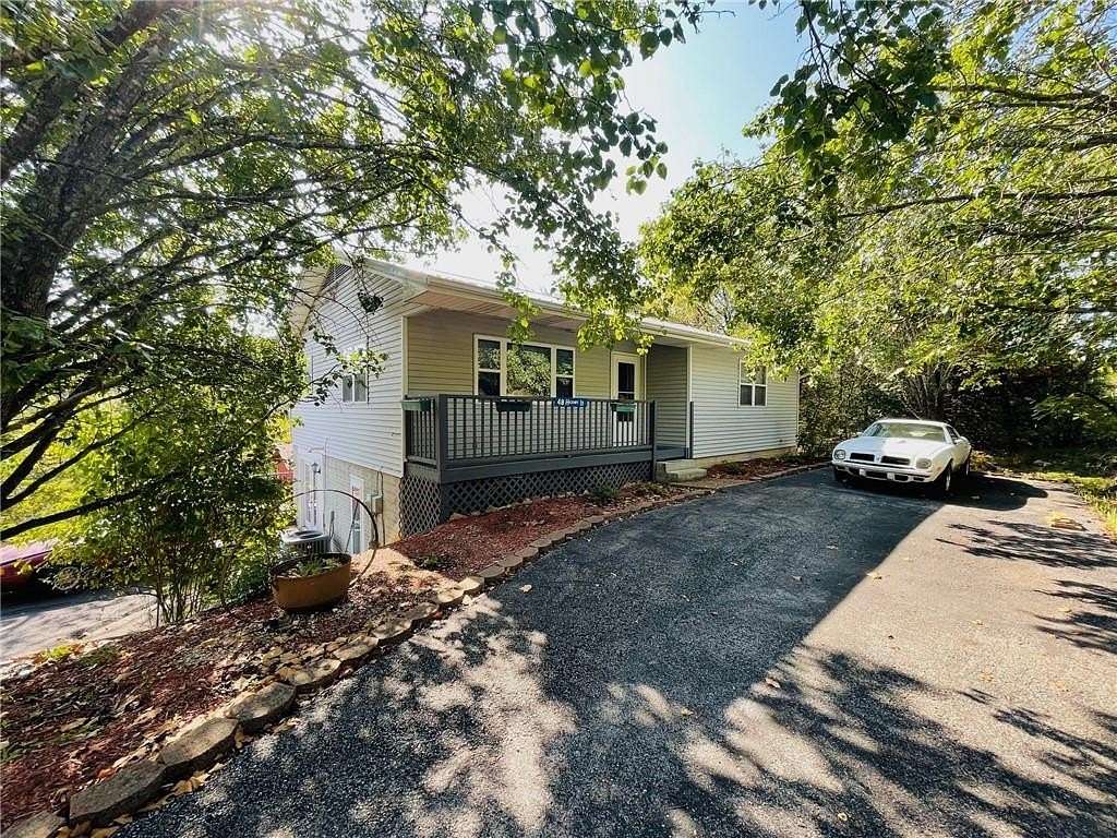 1.8 Acres of Residential Land with Home for Sale in Holiday Island, Arkansas