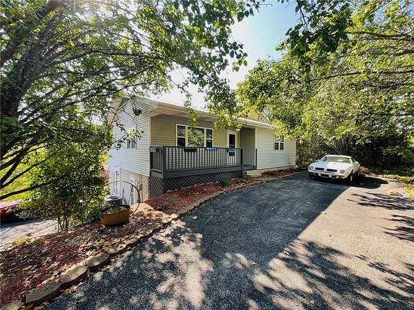 1.8 Acres of Land with Home for Sale in Holiday Island, Arkansas