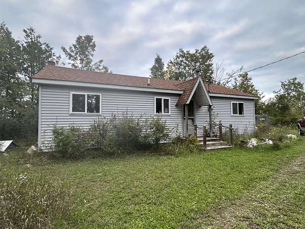 124 Acres of Land with Home for Sale in Posen, Michigan