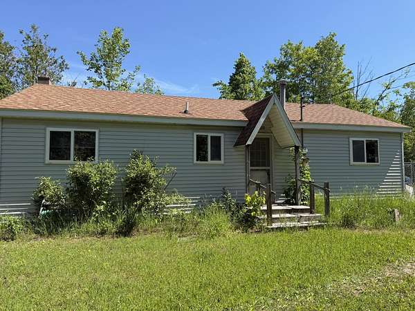124 Acres of Recreational Land with Home for Sale in Posen, Michigan