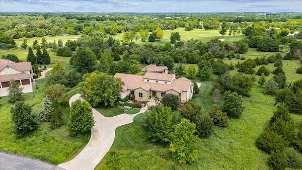 1.6 Acres of Residential Land with Home for Sale in Andover, Kansas