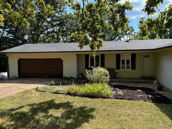 4.88 Acres of Residential Land with Home for Sale in Byrnes Mill, Missouri