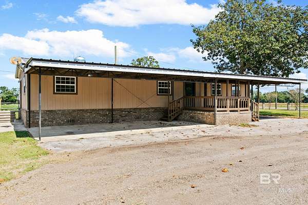 2.55 Acres of Improved Mixed-Use Land for Sale in Jay, Florida