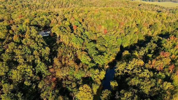10 Acres of Residential Land with Home for Sale in Evening Shade, Arkansas