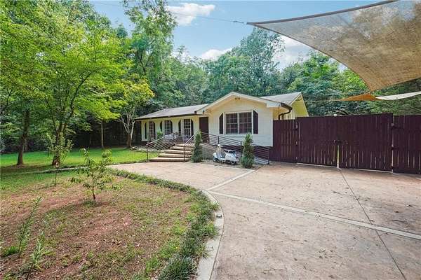 3 Acres of Residential Land with Home for Sale in Riverdale, Georgia