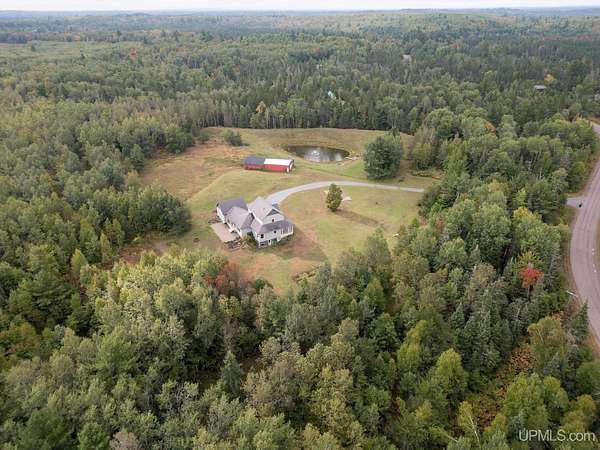 33.2 Acres of Land with Home for Sale in Champion, Michigan