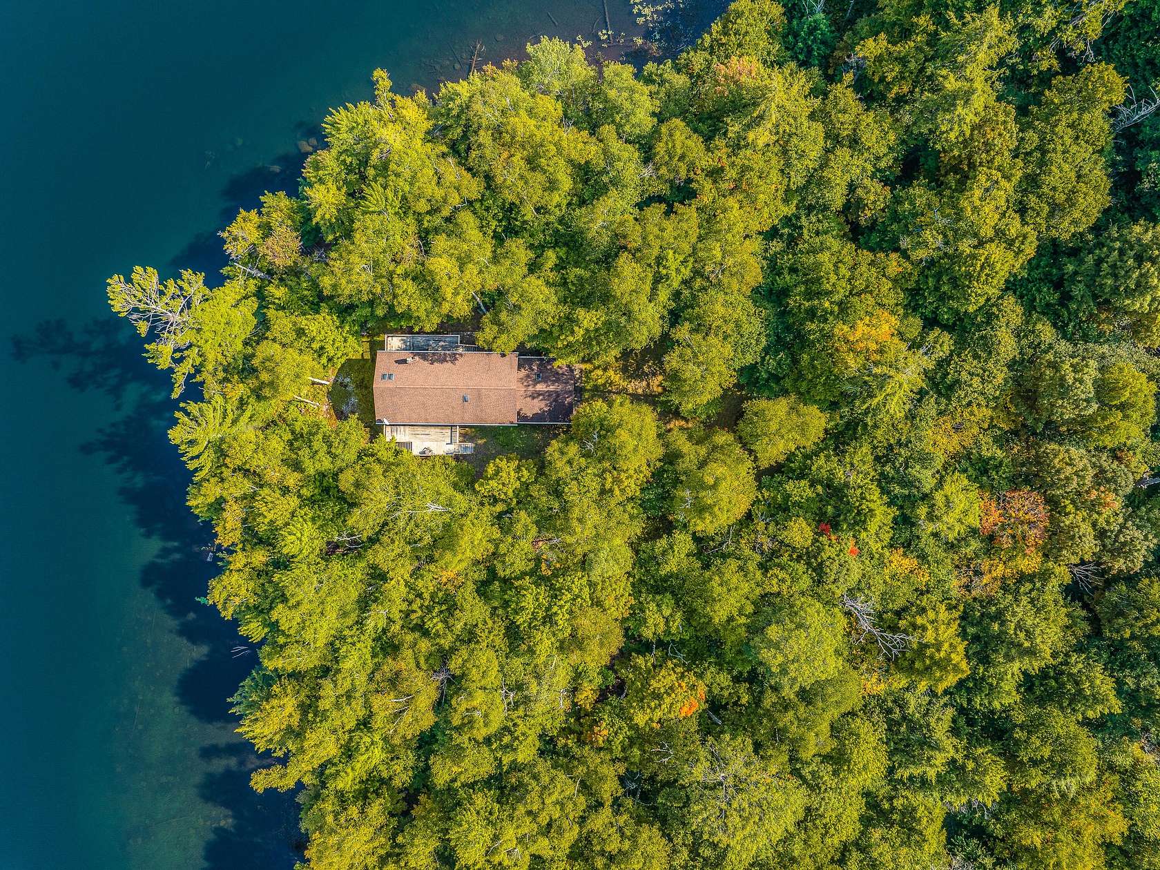 7.49 Acres of Residential Land with Home for Sale in Tupper Lake, New York