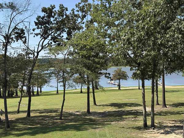 1.63 Acres of Residential Land with Home for Sale in Brookeland, Texas