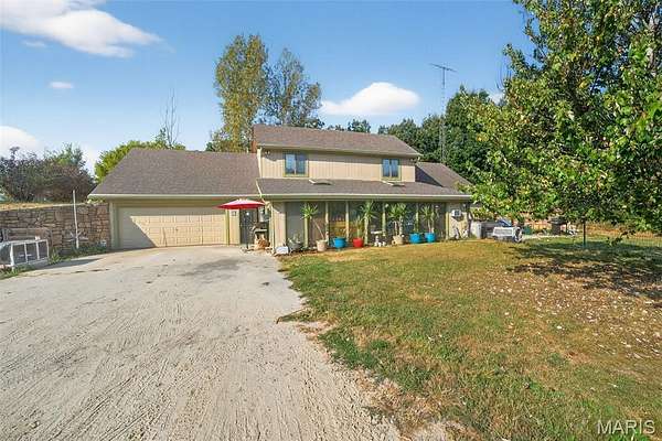 7.75 Acres of Residential Land with Home for Sale in Wright City, Missouri