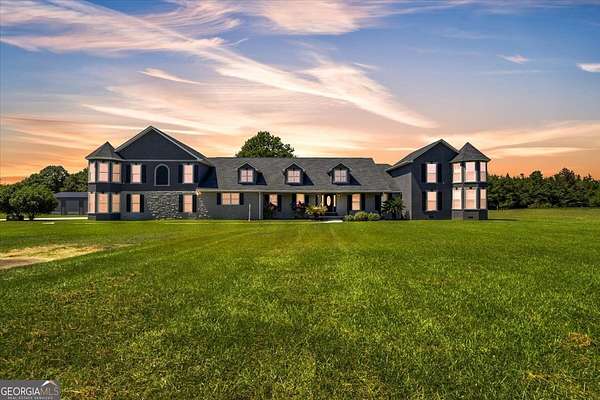 12.2 Acres of Land with Home for Sale in Byron, Georgia