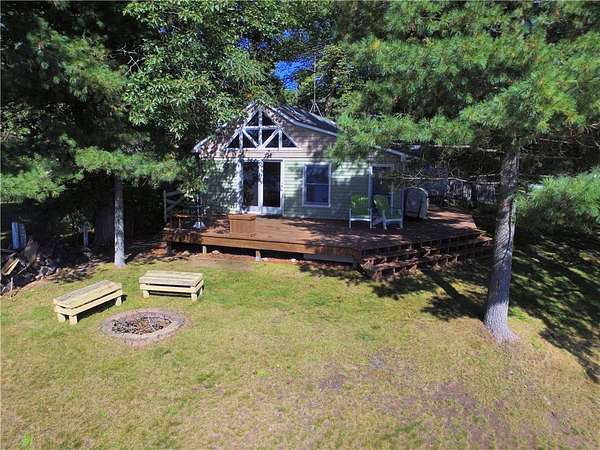 0.24 Acres of Residential Land with Home for Sale in Milltown, Wisconsin