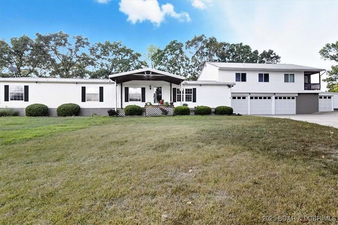 2.59 Acres of Residential Land with Home for Sale in Linn Creek, Missouri