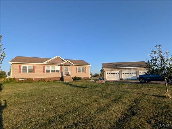 2.38 Acres of Residential Land with Home for Sale in Three Mile Bay, New York