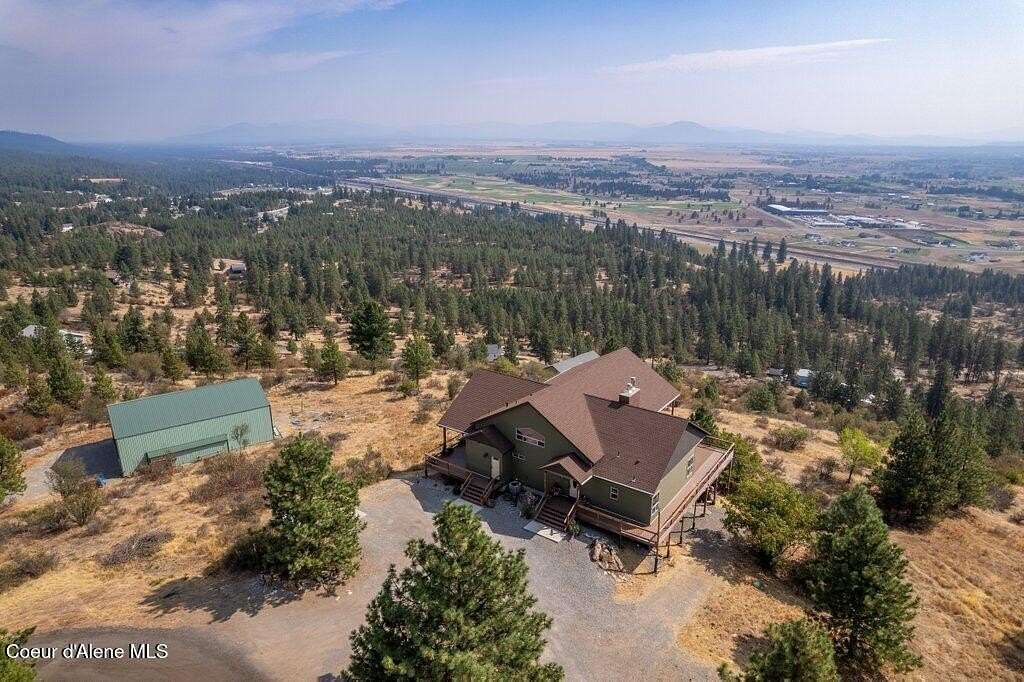 10.2 Acres of Land with Home for Sale in Hauser, Idaho